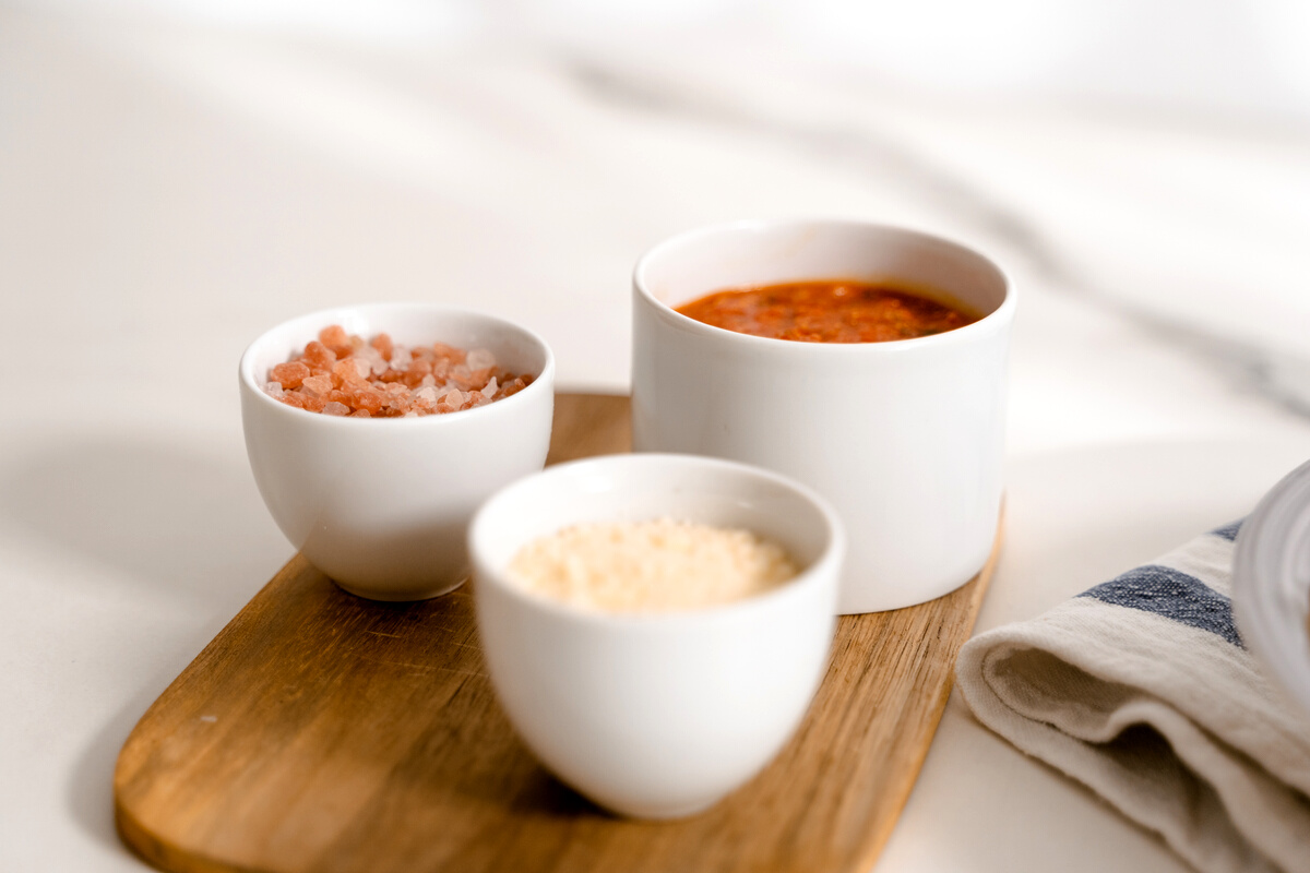 White Ceramic Bowl on Brown Wooden Table